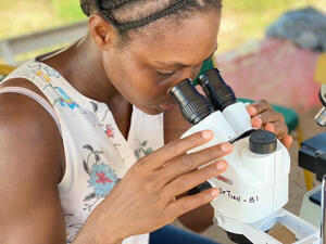 woman at microscope