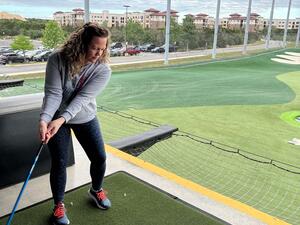 Chrissy at the golf range