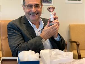 Larry with his bobblehead