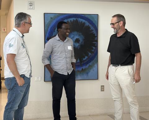Project discussion with Drs. Fred Chevalier, Yves-Nathan Tian-Bi, and Tim Anderson (left to right).