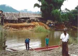 Patients crossing the River Moie from Myanmar